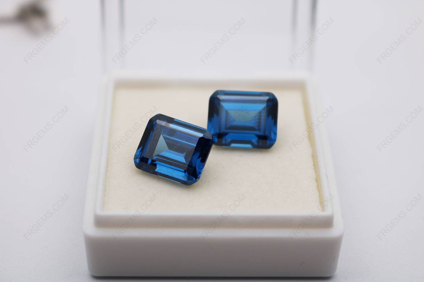 Cubic_Zirconia_Sapphire_Blue_Color_Emerald_Cut_12x10mm_Stones_Supplier_IMG_2940