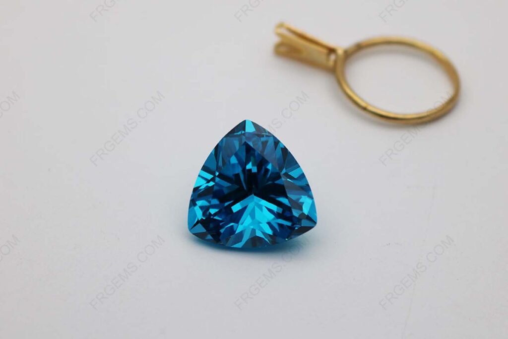 Cubic_Zirconia_Aquamarine_Dark_Shade_Trillion_Shape_faceted_cut_12x12mm_stones_China_IMG_1315