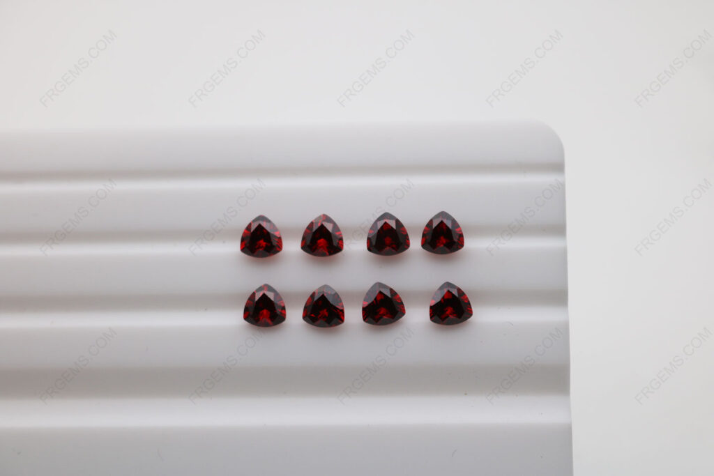 Cubic_Zirconia_Garnet_Red_Dark_Shade_Trillion_Shape_Diamond_faceted_cut_5x5mm_stones_IMG_4907