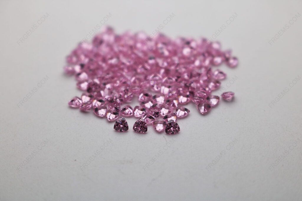 Cubic_Zirconia_Pink_Trillion_Shape_Diamond_faceted_cut_3x3mm_stones_IMG_4913