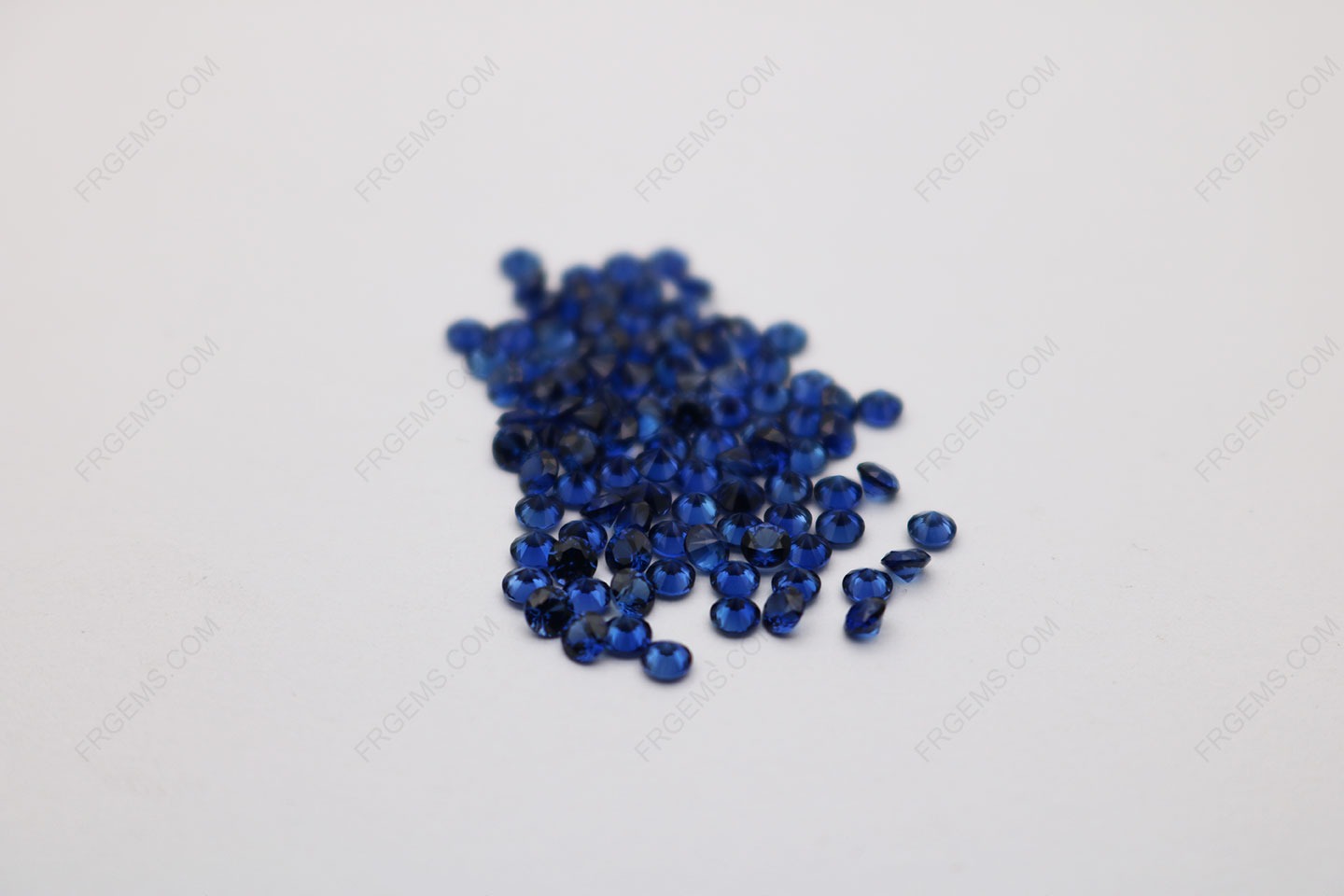 Corundum-Blue-Sapphire-33-Round-Shape-Faceted-Cut-2mm-stones-IMG_2943.jpg