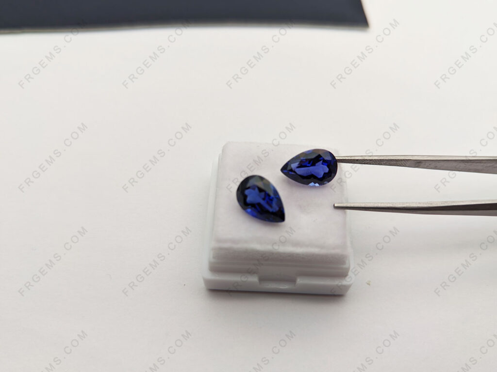 Lab-Grown-Blue-Sapphire-Pear-Shaped-Faceted-Gemstone-Manufacturer