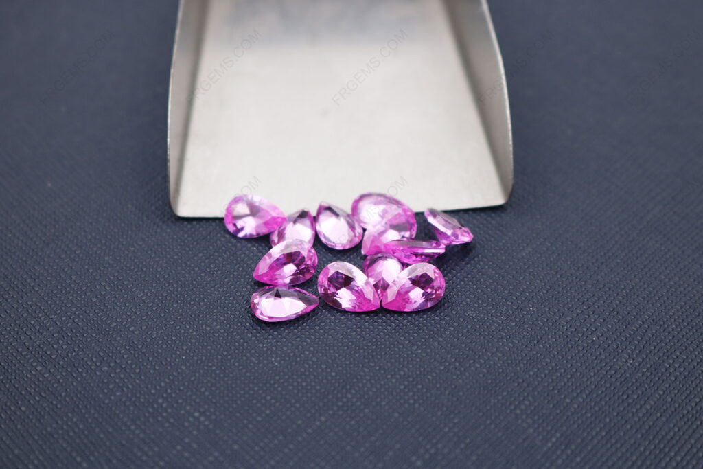 Corundum-Pink-Sapphire-2-Pear-Shape-Faceted-Cut-9x6mm-gemstones-IMG_5882