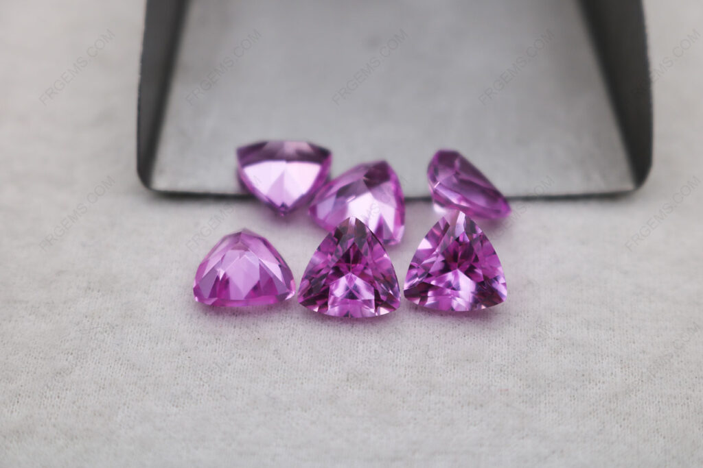 Corundum-Pink-Sapphire-2-Trillion-Shape-Faceted-Cut-9x9mm-gemstones-IMG_5880