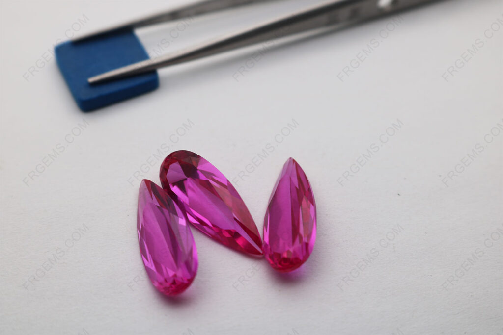 Synthetic-Corundum-Rose-Pink-Sapphire-#3-color-Pear-shape-faceted-cut-22x9mm-gemstones-IMG_6863
