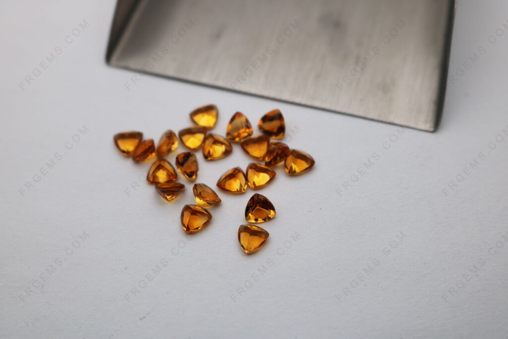 Wholesale-Natural-Genuine-Citrine-Dark-color-Trillion-shape-faceted-cut-5x5mm-gemstones-China-Supplier-IMG_6788