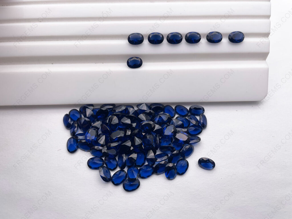 Nano-Crystal-Sapphire-Blue-Dark-121#-color-Oval-faceted-cut-5x7mm-and-4x6mm-gemstones-bulk-wholesale-IMG_1917