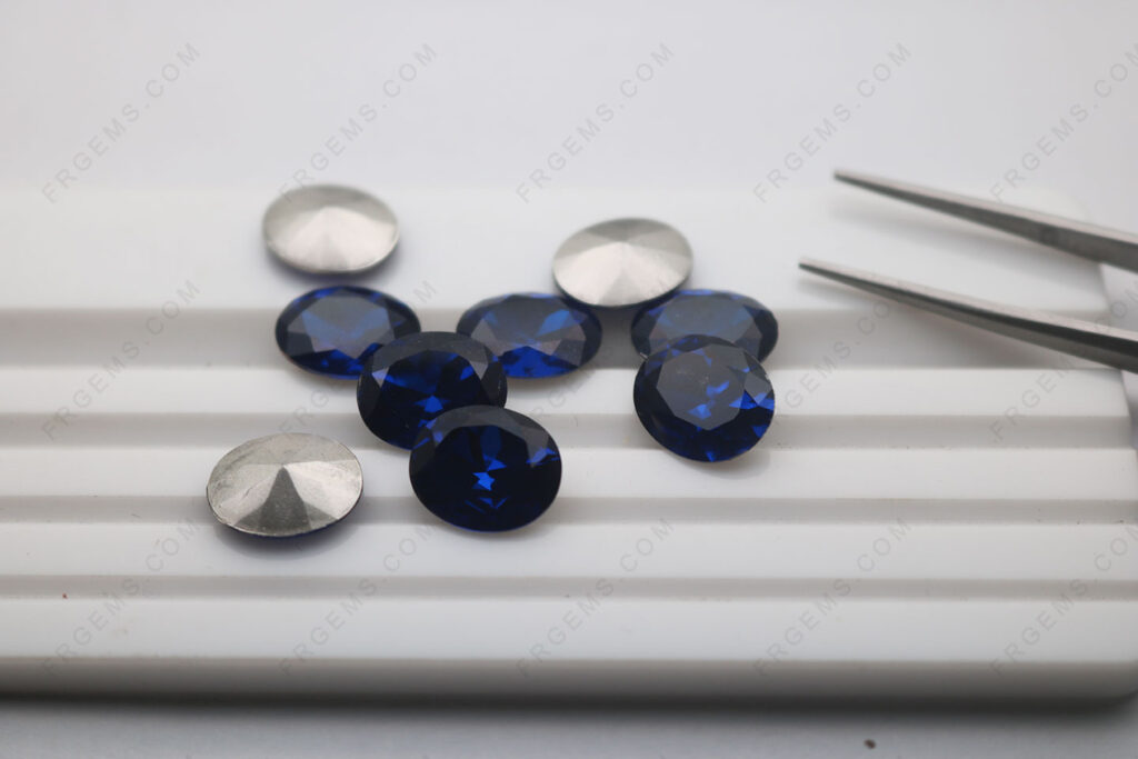 Wholesale-Nanosital-Sapphire-Blue-2:2#-Color-Oval-Shape-faceted-silver-foiled-back-12x10mm-gemstones-from-China-IMG_7881