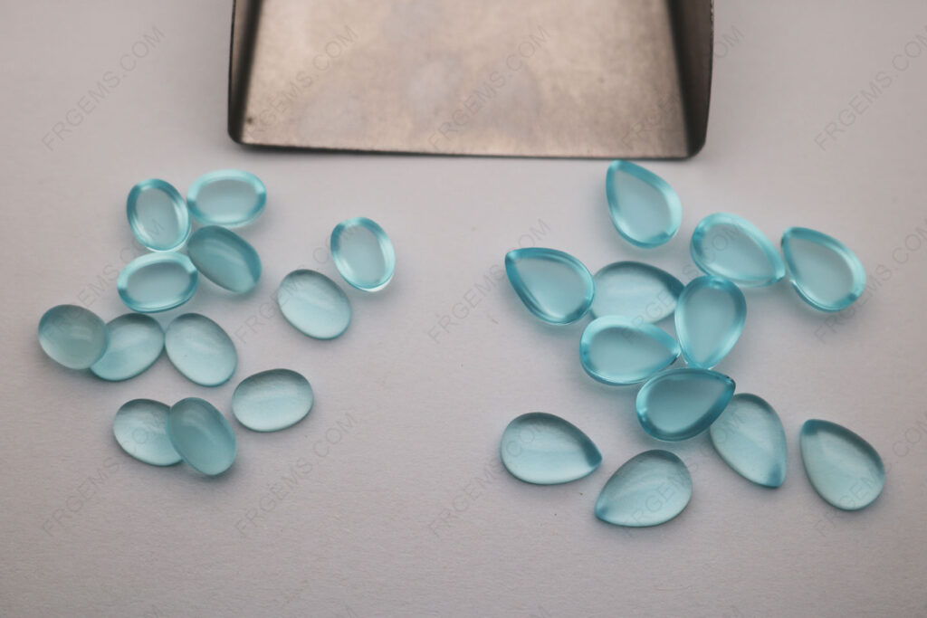 Loose-Glass-Aquamarine-Light-Color-BA301#-Oval-Cabochon-VS-Pear-Cabochon-Gemstones-Factory-from-China-
